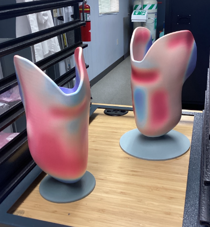 Two 3D printed check sockets in radii devices colors, printed by HP